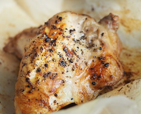 closeup of rosemary, lemon zest and lavender chicken breasts