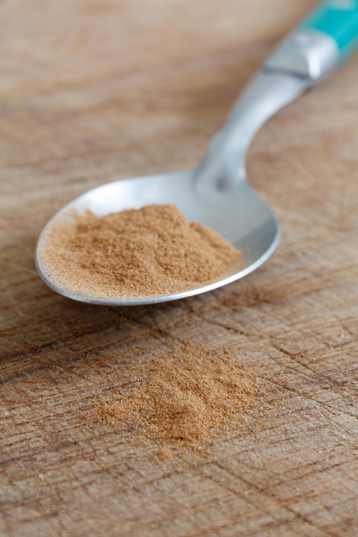 Pumpkin Pie Spice: Aphrodisiac with a Scent for Seduction 1 a closeup of pumpkin pie spice on a silver spoon with a turquoise handle