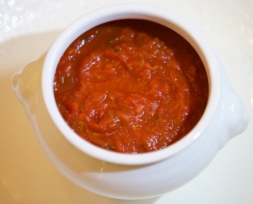 Closeup of Salsa Agrodolce in a white, ceramic dish