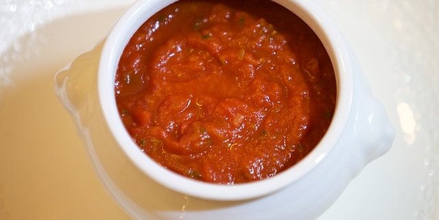 Closeup of Salsa Agrodolce in a white, ceramic dish