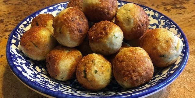 closeup of Chinese Chicken Meatballs in a blue and white bowl