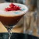 Lychee Chocolate Martini with edible flowers on top