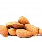 closeup of pile of almonds to help illustrate the benefits of almonds