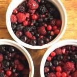 bowls of fresh berries to illustrate reducing refined sugar