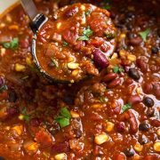 The Best Plant-Based Chili Recipe (Vegan) 2 Closeup of Quinoa and Vegetable Chili with Ladle