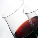 a pair of wine glasses with red wine to illustrate wine and sex