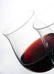 a pair of wine glasses with red wine to illustrate wine and sex