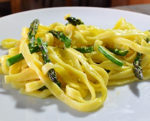 White Plate with Vegetarian Linguine with Asparagus and Green Garlic