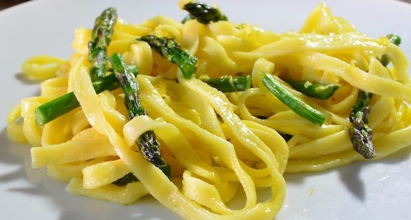 White Plate with Vegetarian Linguine with Asparagus and Green Garlic