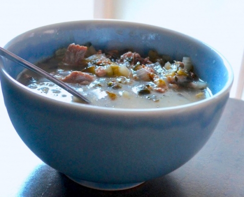 Closeup of Leftover Turkey Soup in a blue bowl