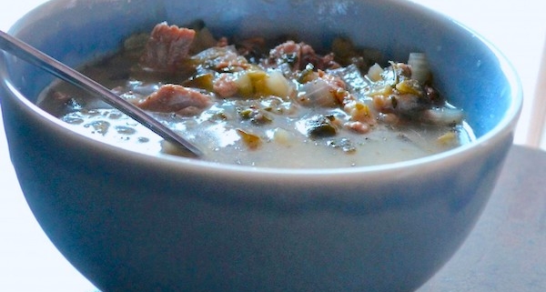 Closeup of Leftover Turkey Soup in a blue bowl