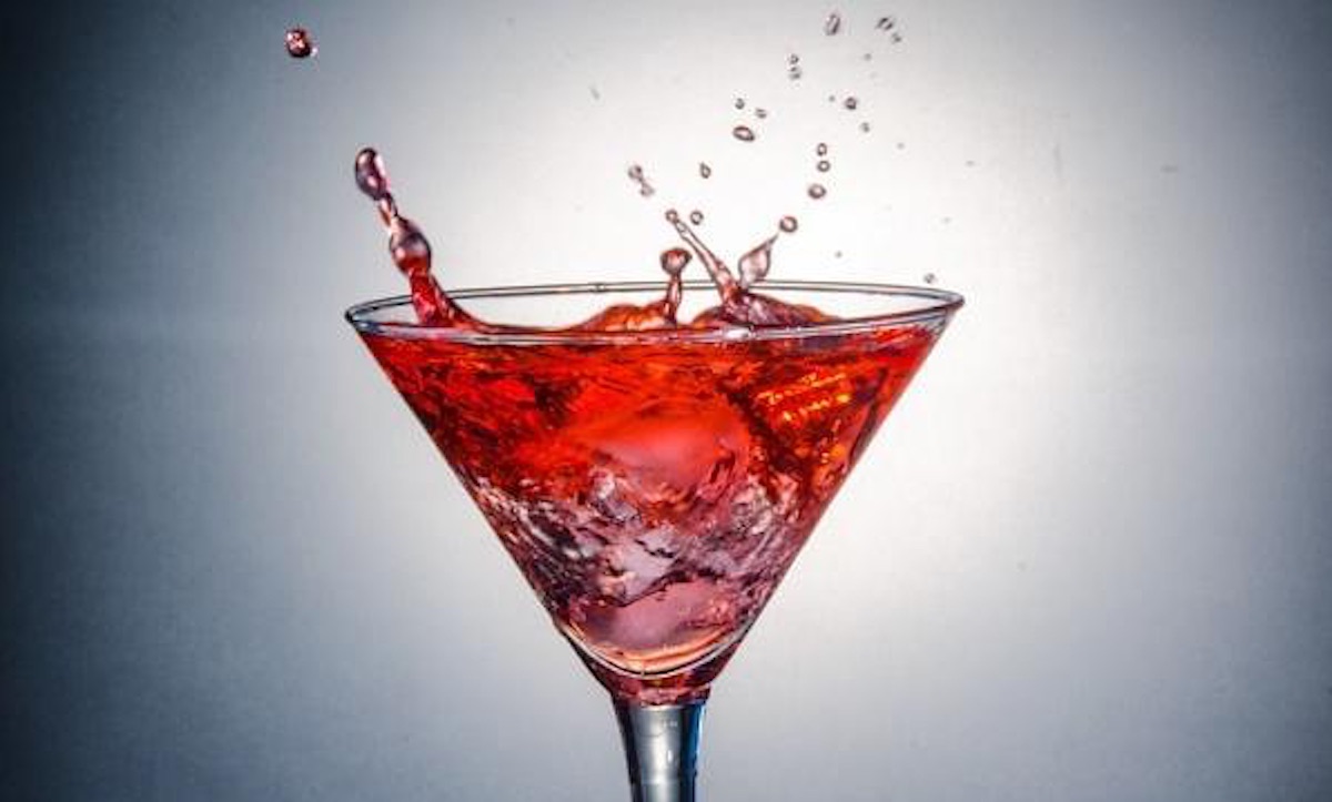 Closeup of the Aphrodisiac cocktail being splashed