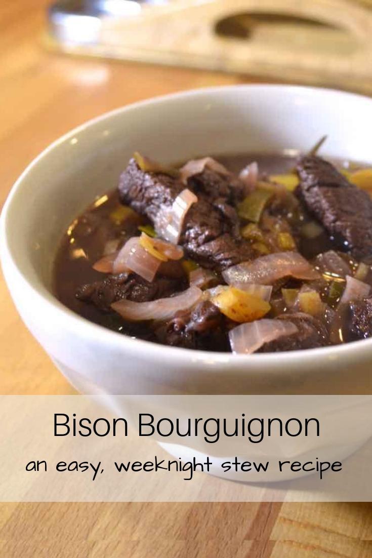 White Bowl with Bison Bourgignon on Cutting Board