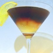 A Bourbon Lemon Cocktail Worthy of the Kentucky Derby 2 Closeup of the bourbon lemon cocktail with a lemon wedge for garnish