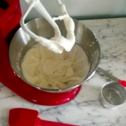 Crème Fraîche Frosting Recipe 2 Creme Fraiche Frosting in a red Kitchenaid mixer