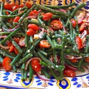 closeup of greek green bean tomato feta salad