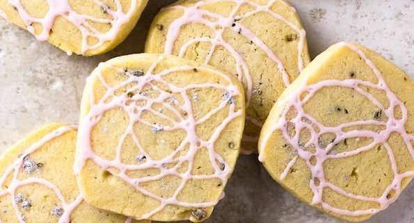 closeup of what this lavender butter cookies recipe should look like when it's baked and drizzled with icing