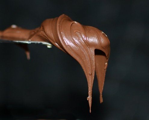 Melting chocolate on a spoon