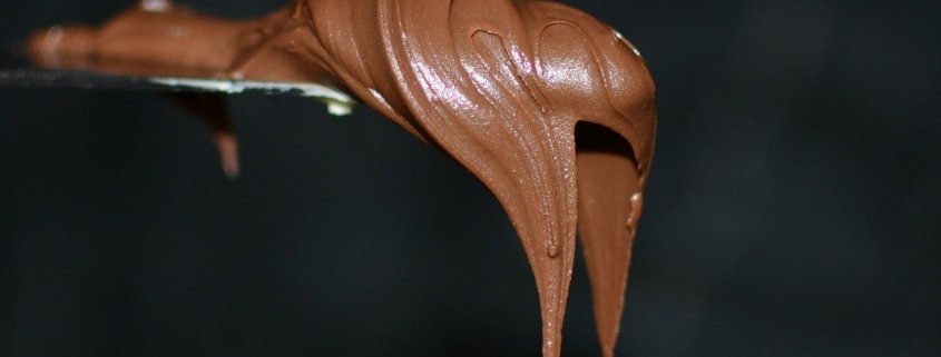 Melting chocolate on a spoon