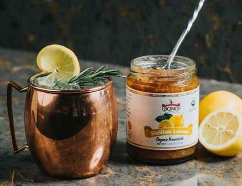 Closeup of an Italian Mule in a Copper Cup with Sicilian Marmalade Jar