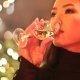 closeup of woman drinking dessert wine