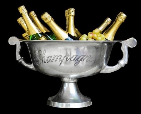 ice bucket filled with Champagne bottles, illustrating how to become a Champagne expert