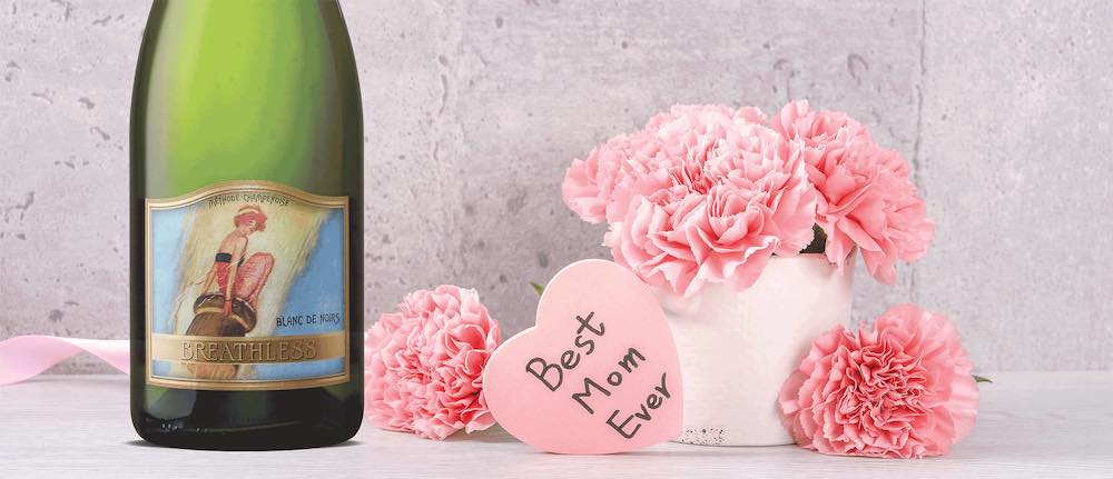 Breathless Wines Mother's Day Promotion photo with pink hearts and a bottle of sparkling wine