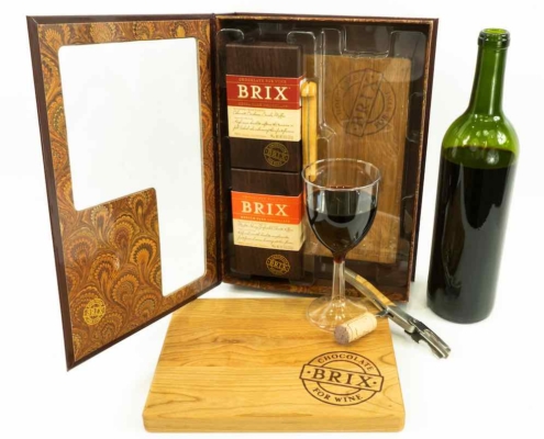 Organic Turmeric Drink from Healthee 2 Pairing wine with chocolate gift set from Brix chocolate with a knife, cutting board, chocolates and wine