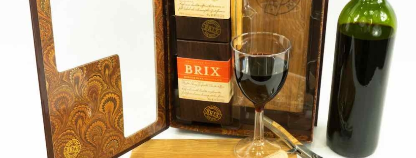 Pairing wine with chocolate gift set from Brix chocolate with a knife, cutting board, chocolates and wine