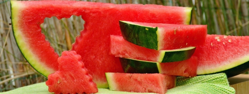 A watermelon with a heart cutout to emphasize the benefits of watermelon to your health