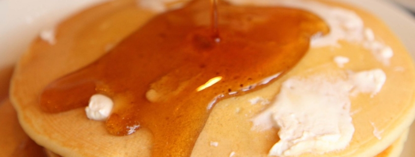 Maple Syrup Benefits and Aphrodisiac Use 1 maple syrup poured onto pancakes with butter