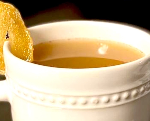 tequila hot toddy cocktail in a white mug