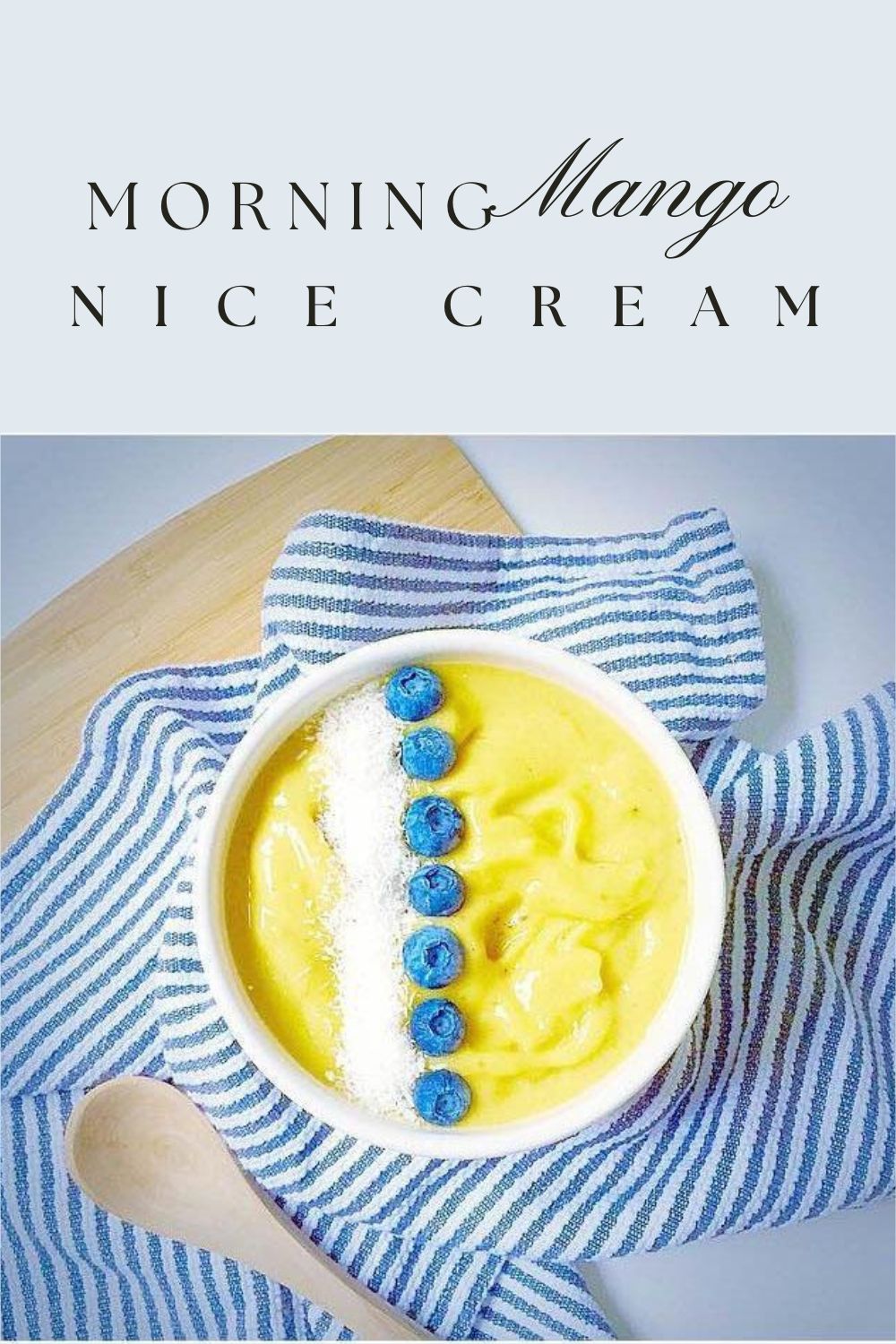 nice cream graphic with a closeup of of the nice cream in a white bowl garnished with blueberry and coconut on top of a blue and white napkin and the text, "morning mango nice cream" 