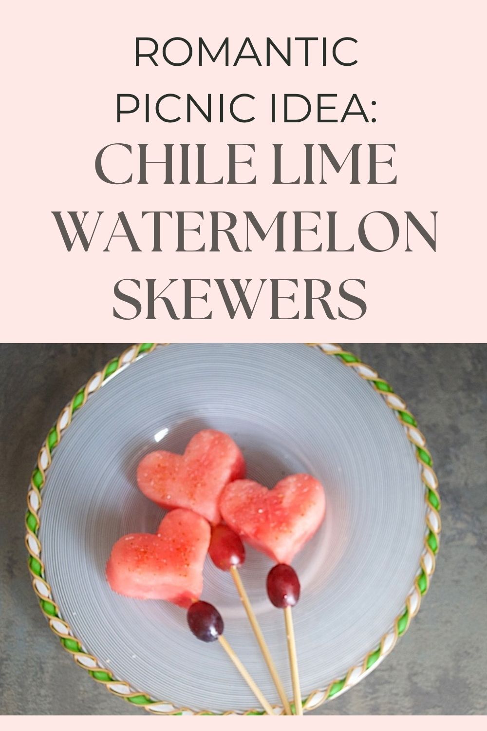 watermelon skewer graphic with a closeup of three skewers on a white plate and the text, "romantic picnic idea: Chile lime watermelon skewers"