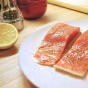 poached Irish salmon with Irish butter sauce on a white plate