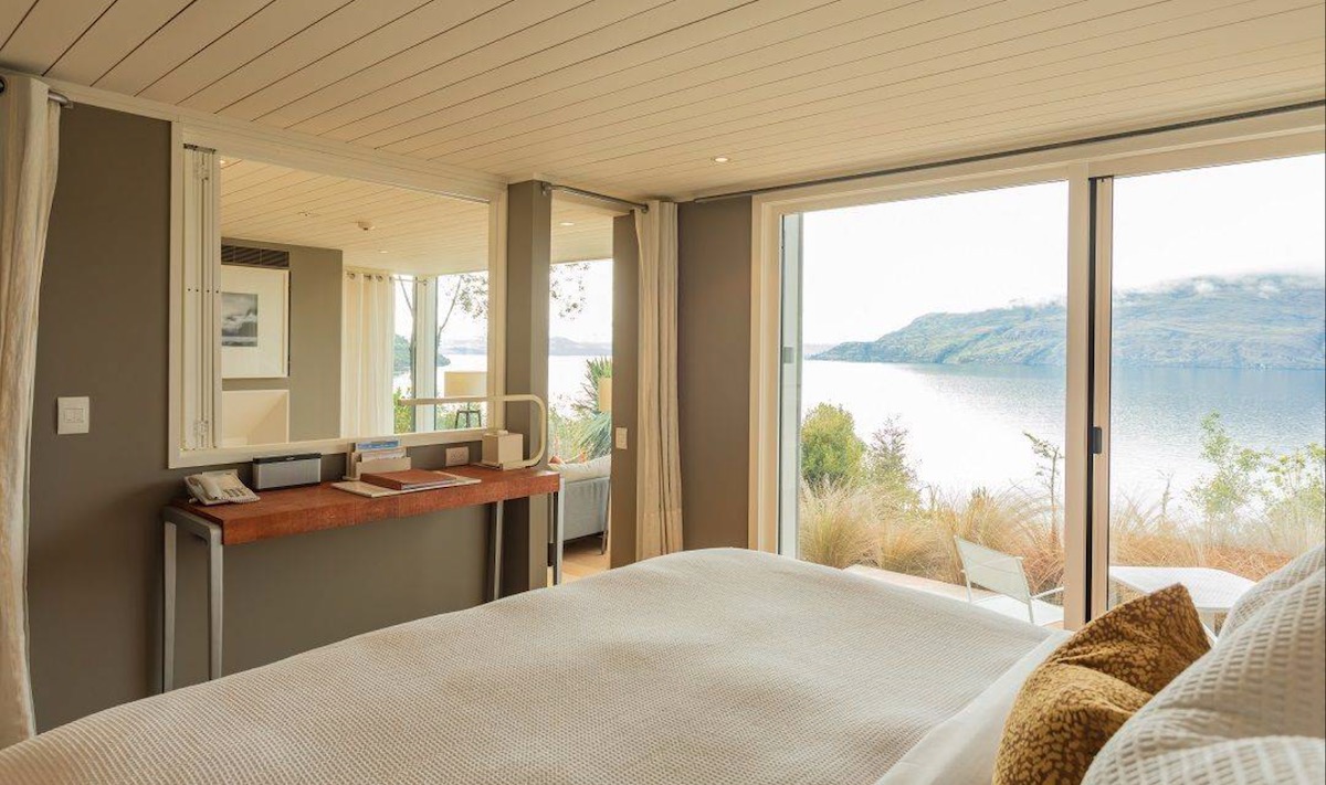 Guest room at Matakauri Lodge with view of the mountains