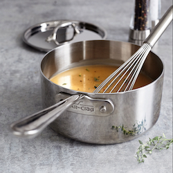 all-clad 3qt sauce pan with a whisk