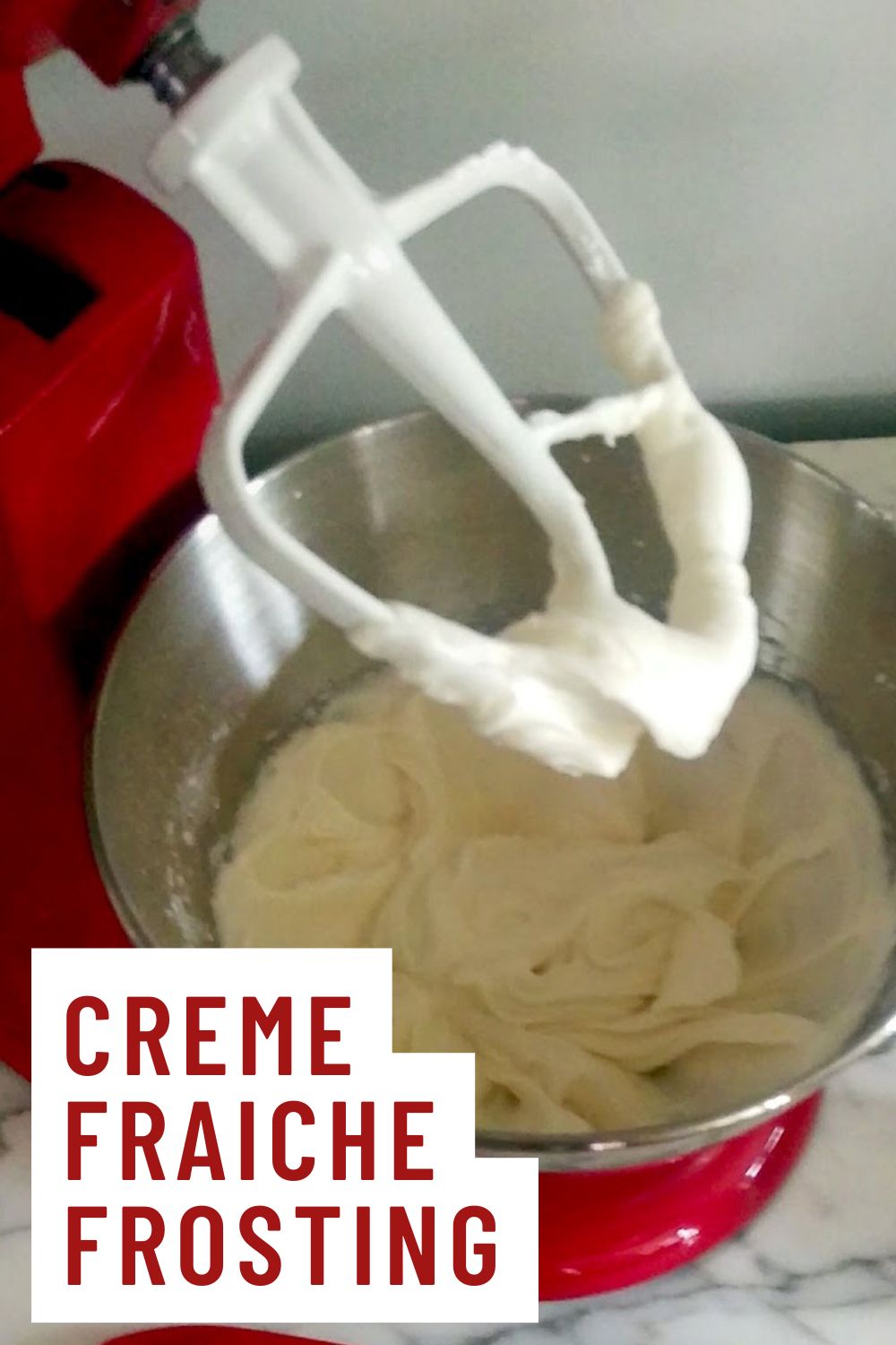 How to Make Crème Fraîche Frosting 2 graphic with a closeup of the frosting in a red stand mixer and the text in red reading, "creme fraiche frosting: