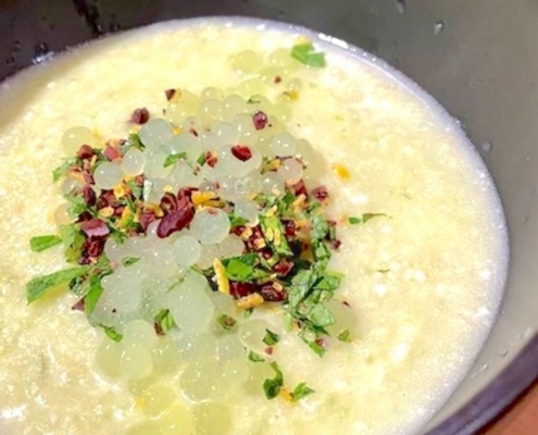 Annette Tomei's white gazpacho in a black bowl
